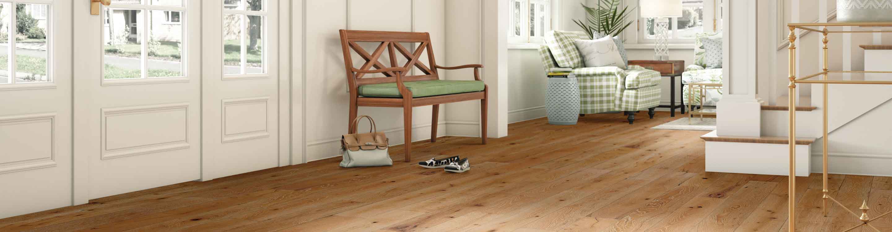 Entryway with hardwood flooring, wooden bench and green accents